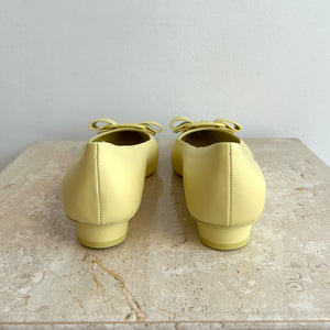 Pre-Owned SALVATORE FERRAGAMO Yellow Bow Flats - Size 8.5