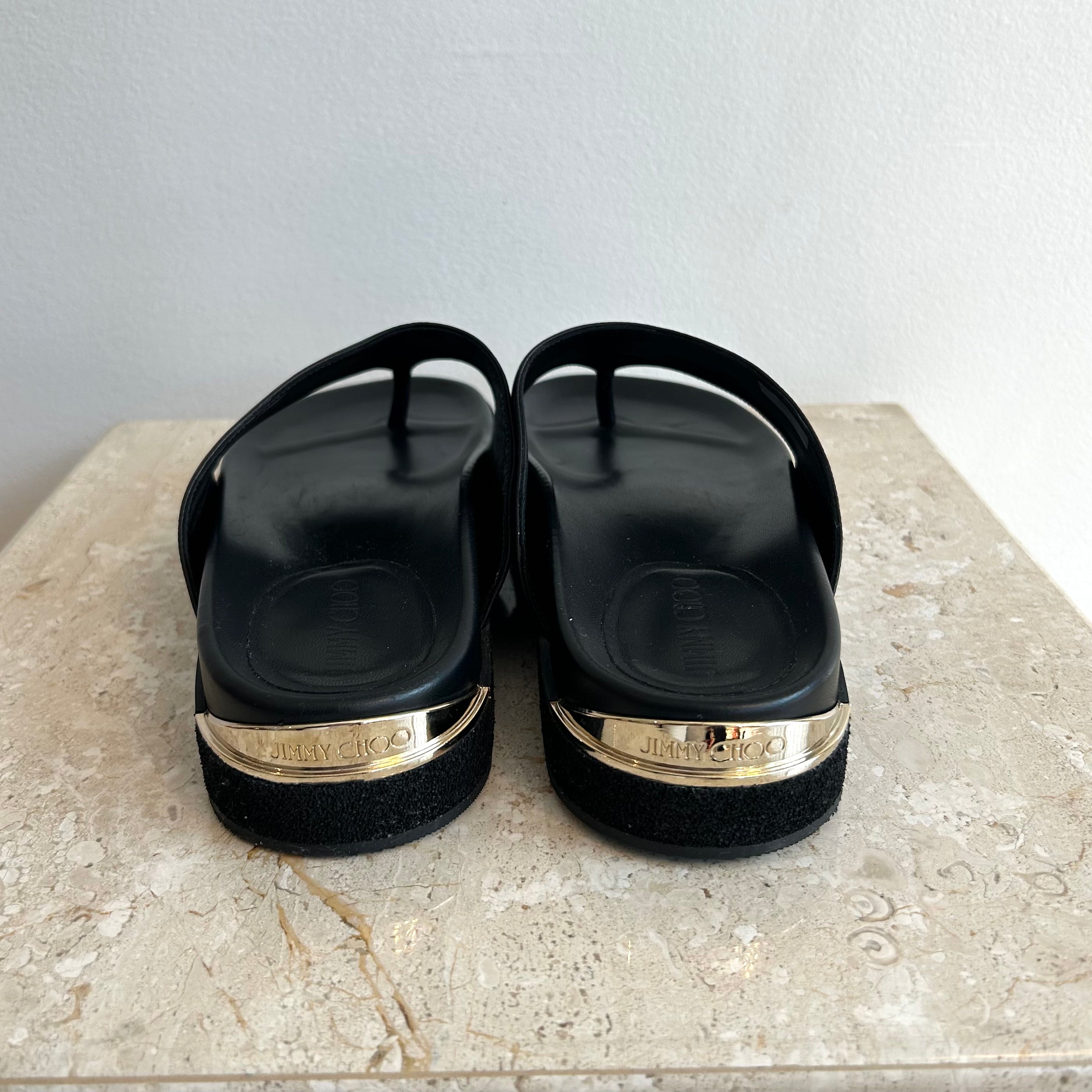 Pre-Owned JIMMY CHOO Black Leather Rowan Thong Slides - 41