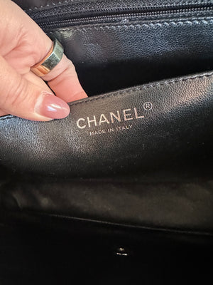 Pre-Owned CHANEL™ Black Patent Maxi Single Flap Bag