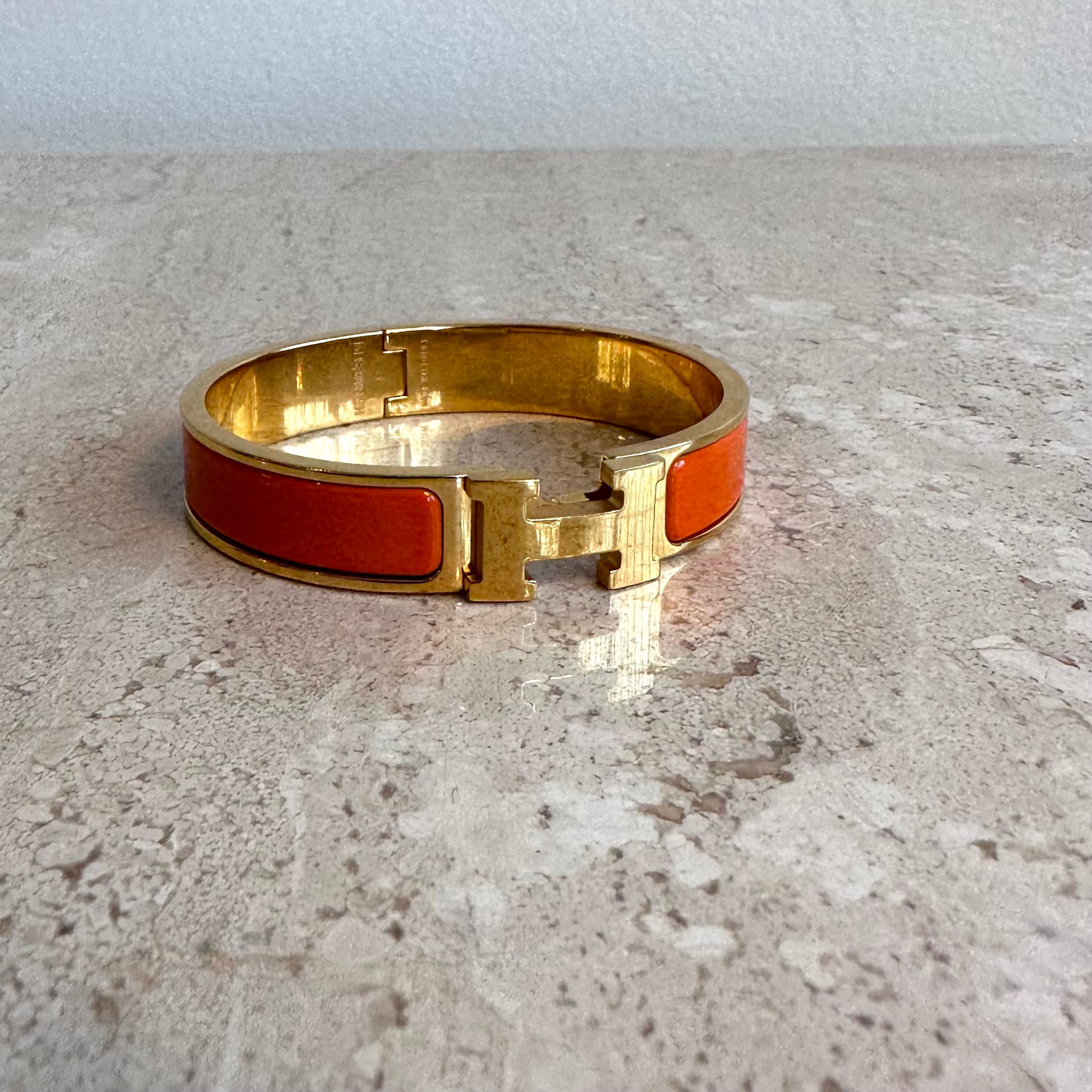 Hermes orange and gold h bracelet Clearance