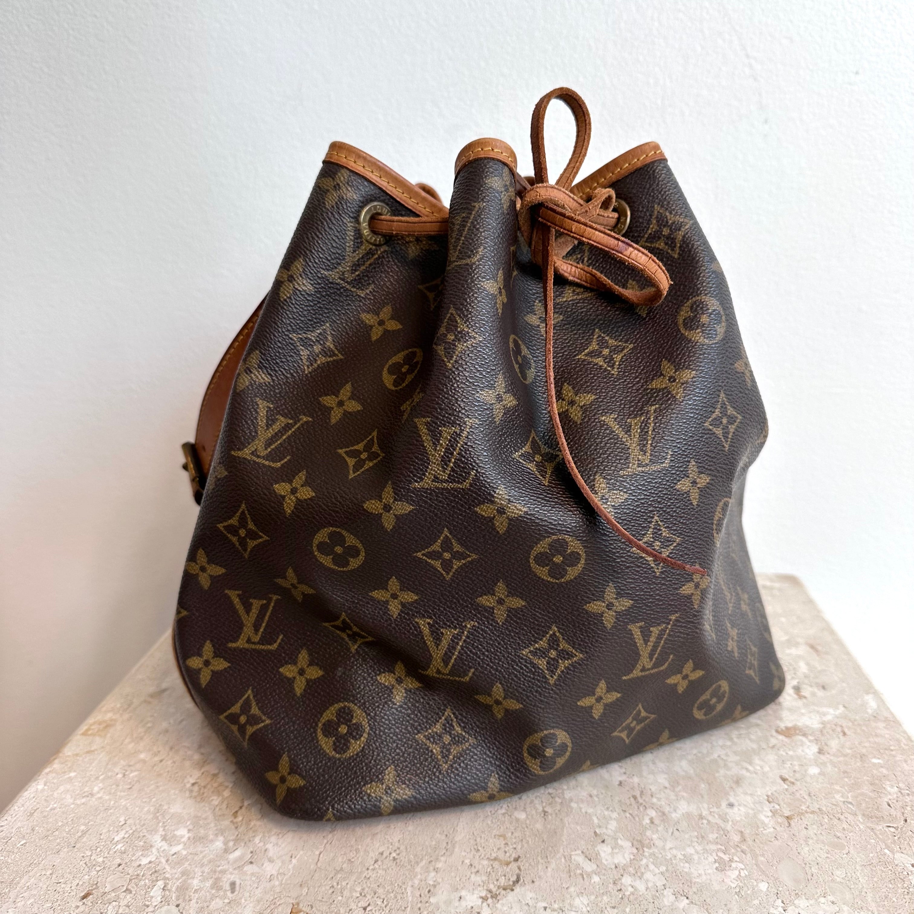 Louis Vuitton Vintage Monogram Petit Noe Bucket Shoulder Bag For Sale at  1stDibs  louis vuitton petit noe vintage lv bucket shoulder bag vintage  petit noe