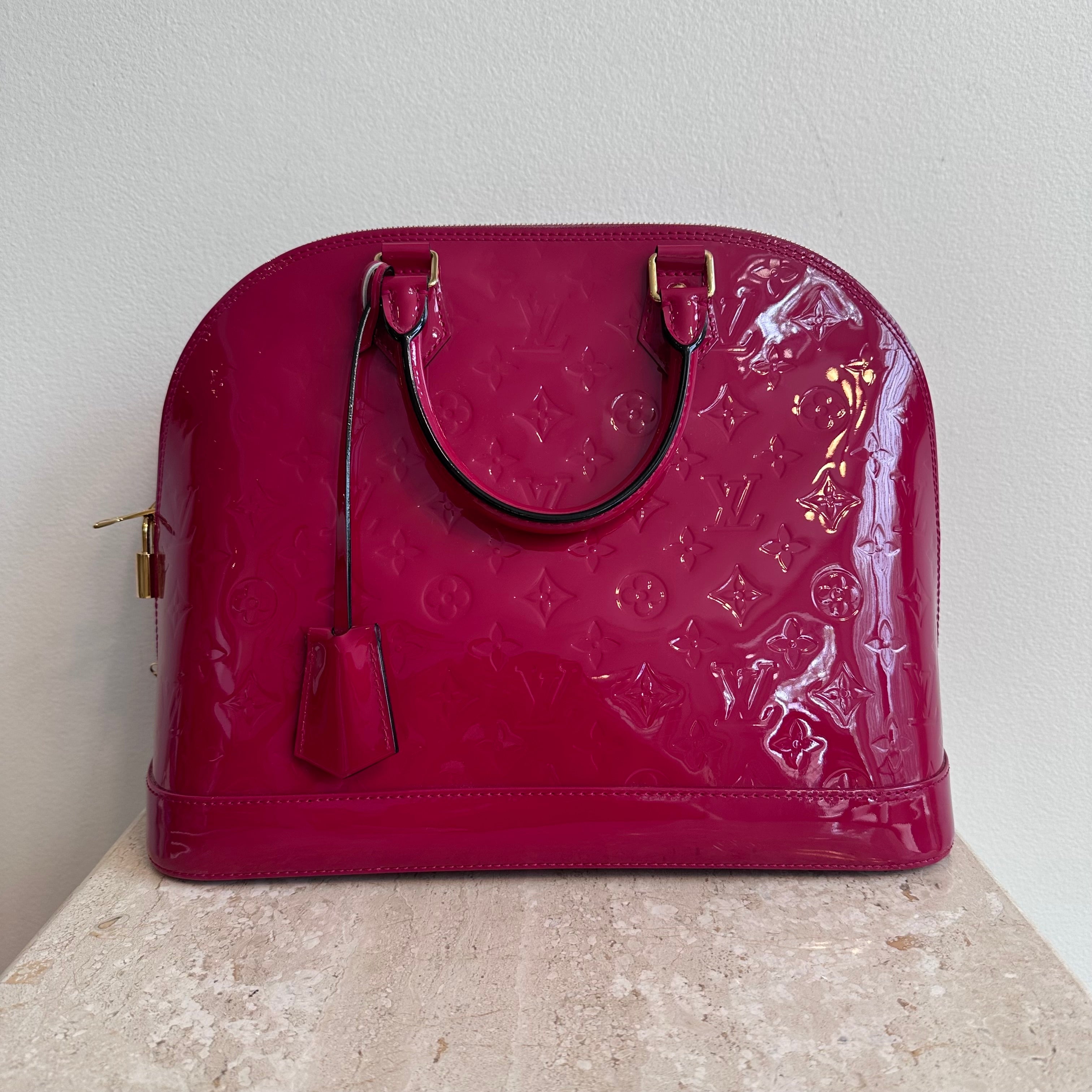 Pre-Owned LOUIS VUITTON Framboise Monogram Vernis Alma GM