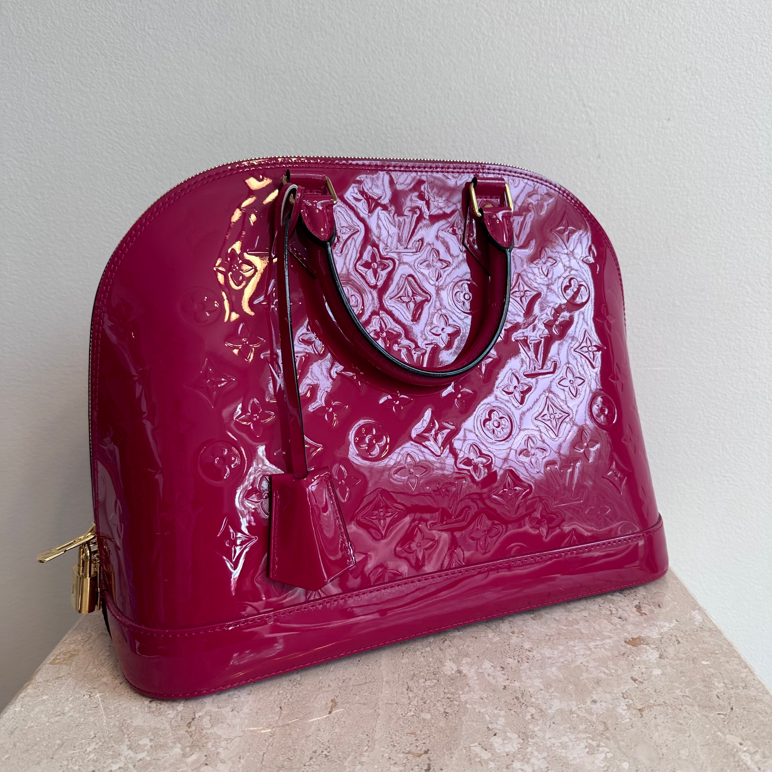 Pre-Owned LOUIS VUITTON Framboise Monogram Vernis Alma GM