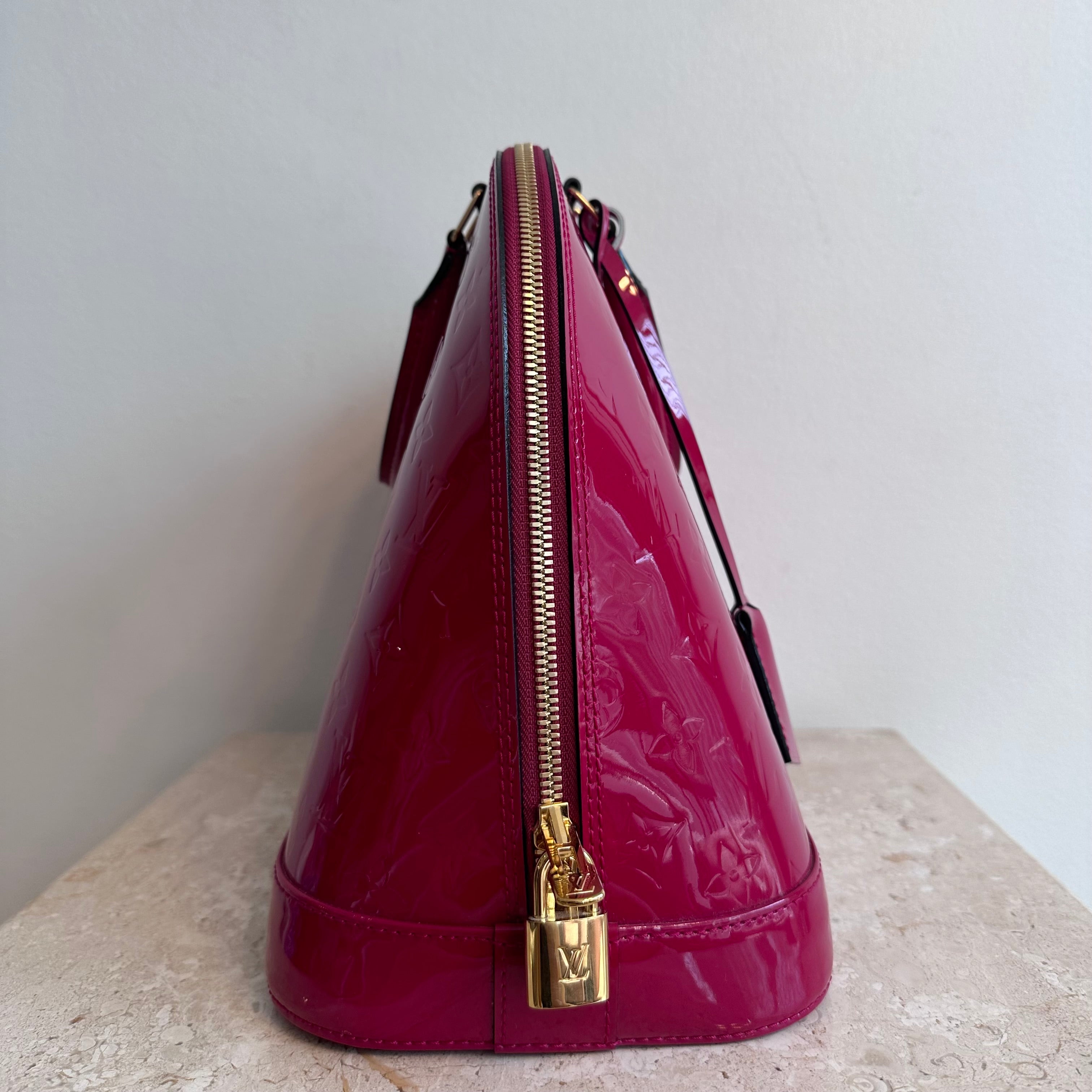 Pre-Owned LOUIS VUITTON Framboise Monogram Vernis Alma GM
