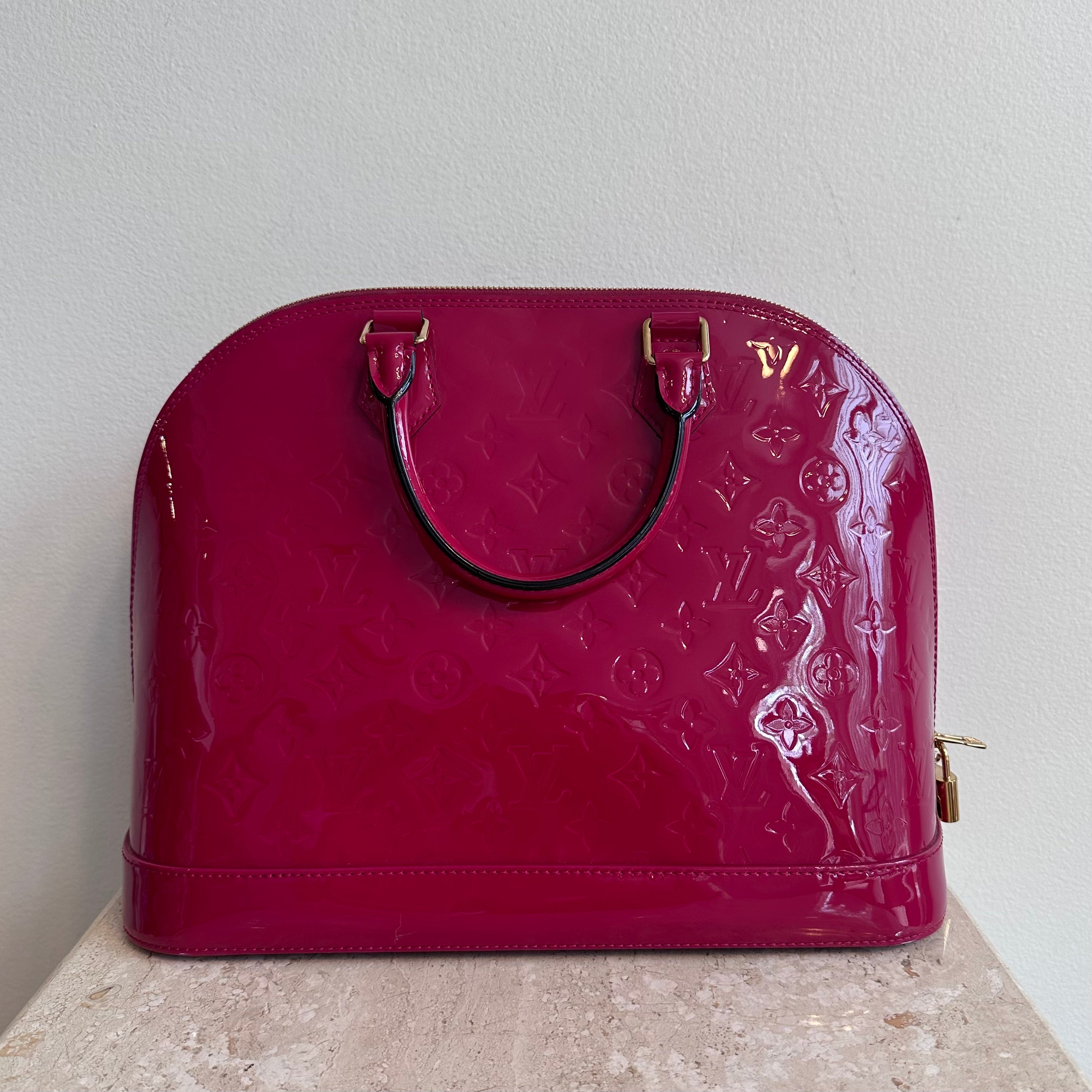 Pre-Owned LOUIS VUITTON Framboise Monogram Vernis Alma GM