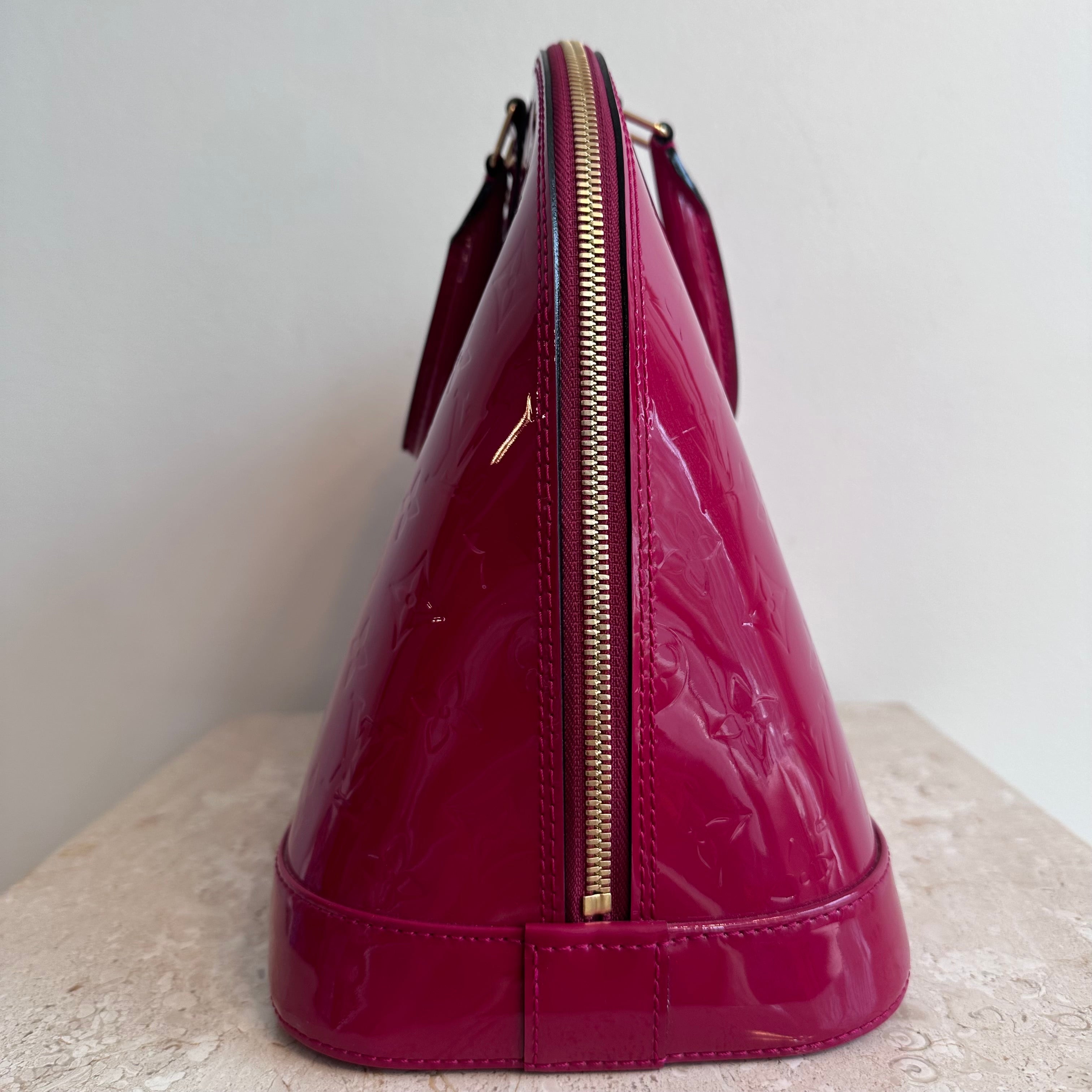 Pre-Owned LOUIS VUITTON Framboise Monogram Vernis Alma GM