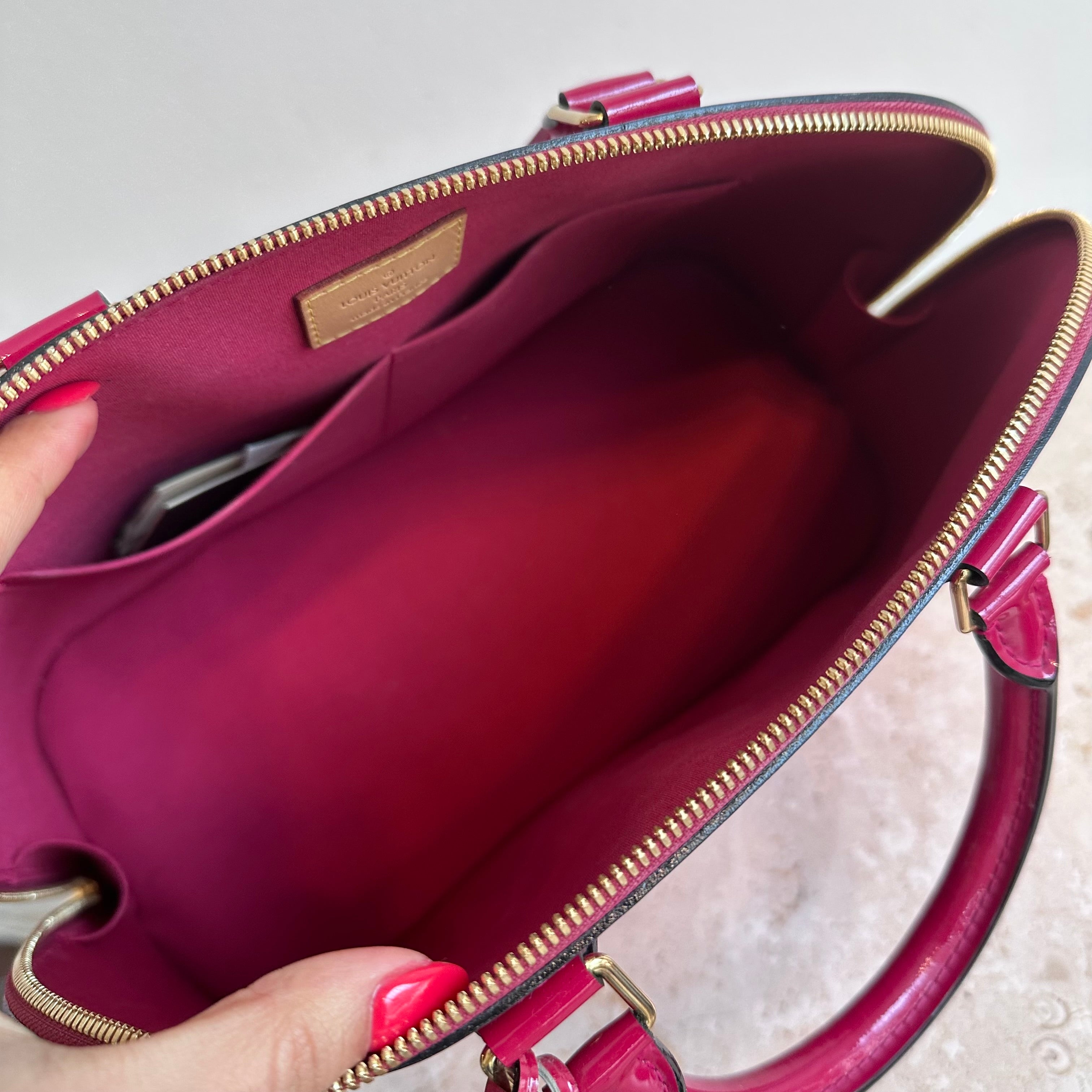 Pre-Owned LOUIS VUITTON Framboise Monogram Vernis Alma GM