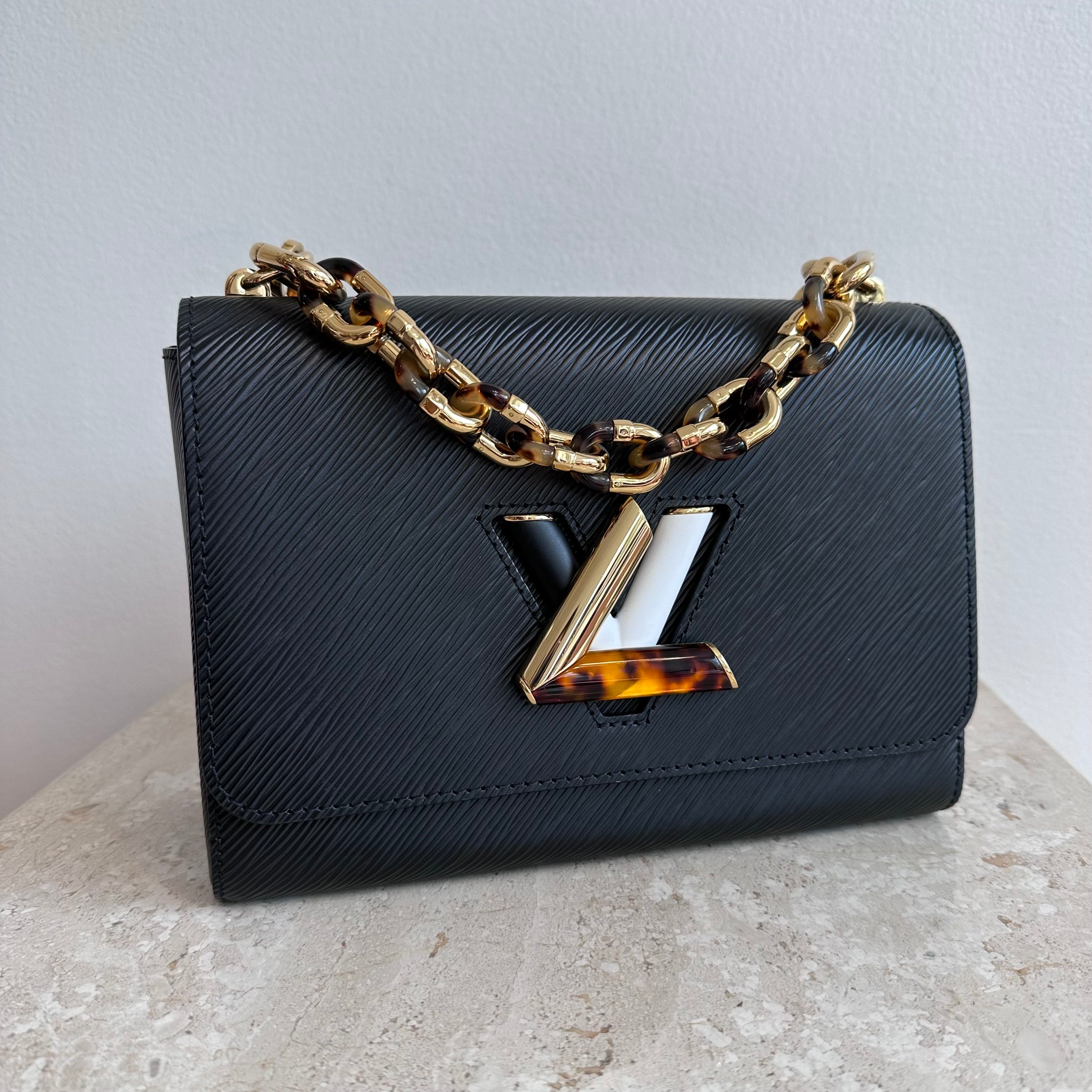 Pre-Owned LOUIS VUITTON Black Epi Tortoiseshell Twist MM Bag