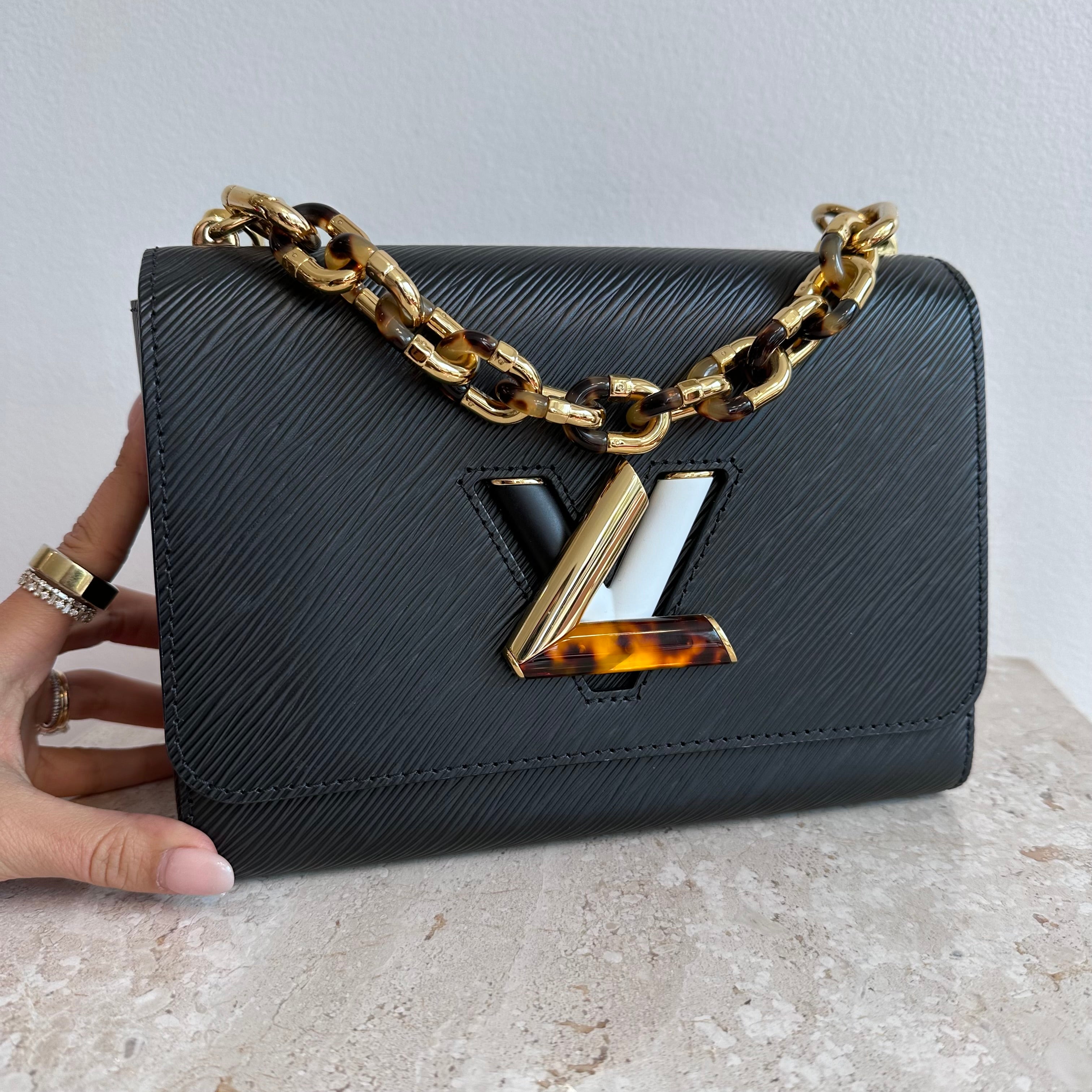 Pre-Owned LOUIS VUITTON Black Epi Tortoiseshell Twist MM Bag