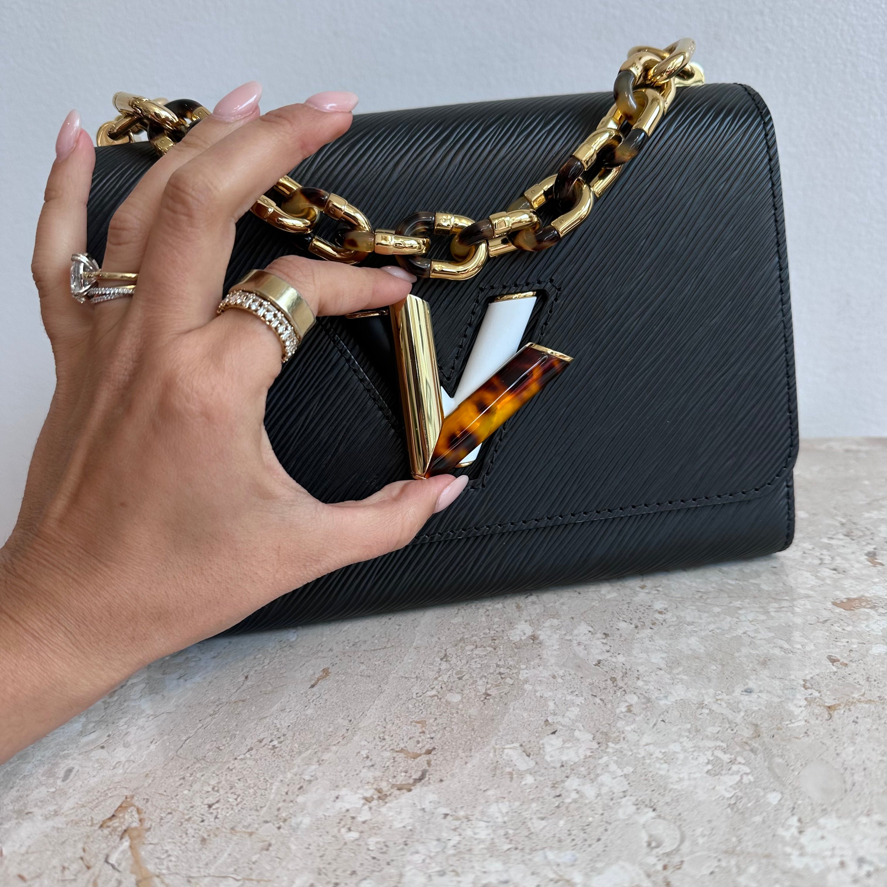 Pre-Owned LOUIS VUITTON Black Epi Tortoiseshell Twist MM Bag