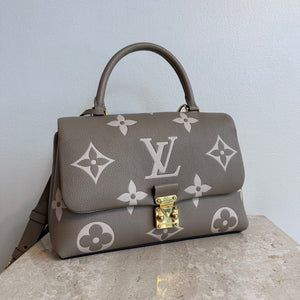 Pre-Owned LOUIS VUITTON Bicolor Monogram Empreinte Madeleine MM