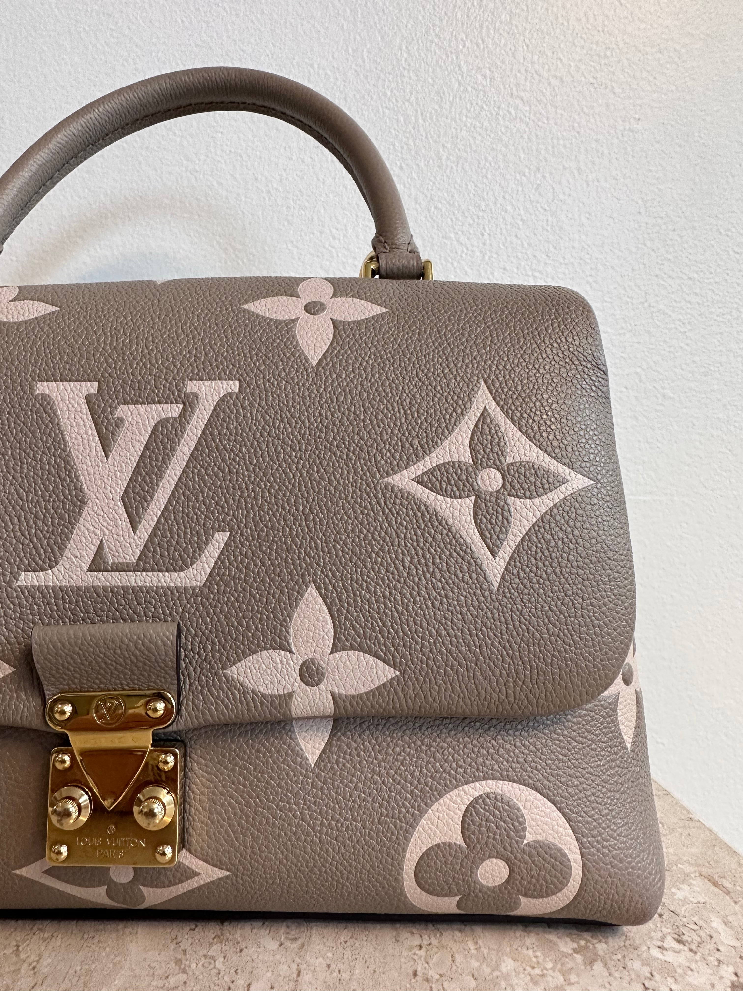 Pre-Owned LOUIS VUITTON Bicolor Monogram Empreinte Madeleine MM