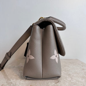 Pre-Owned LOUIS VUITTON Bicolor Monogram Empreinte Madeleine MM