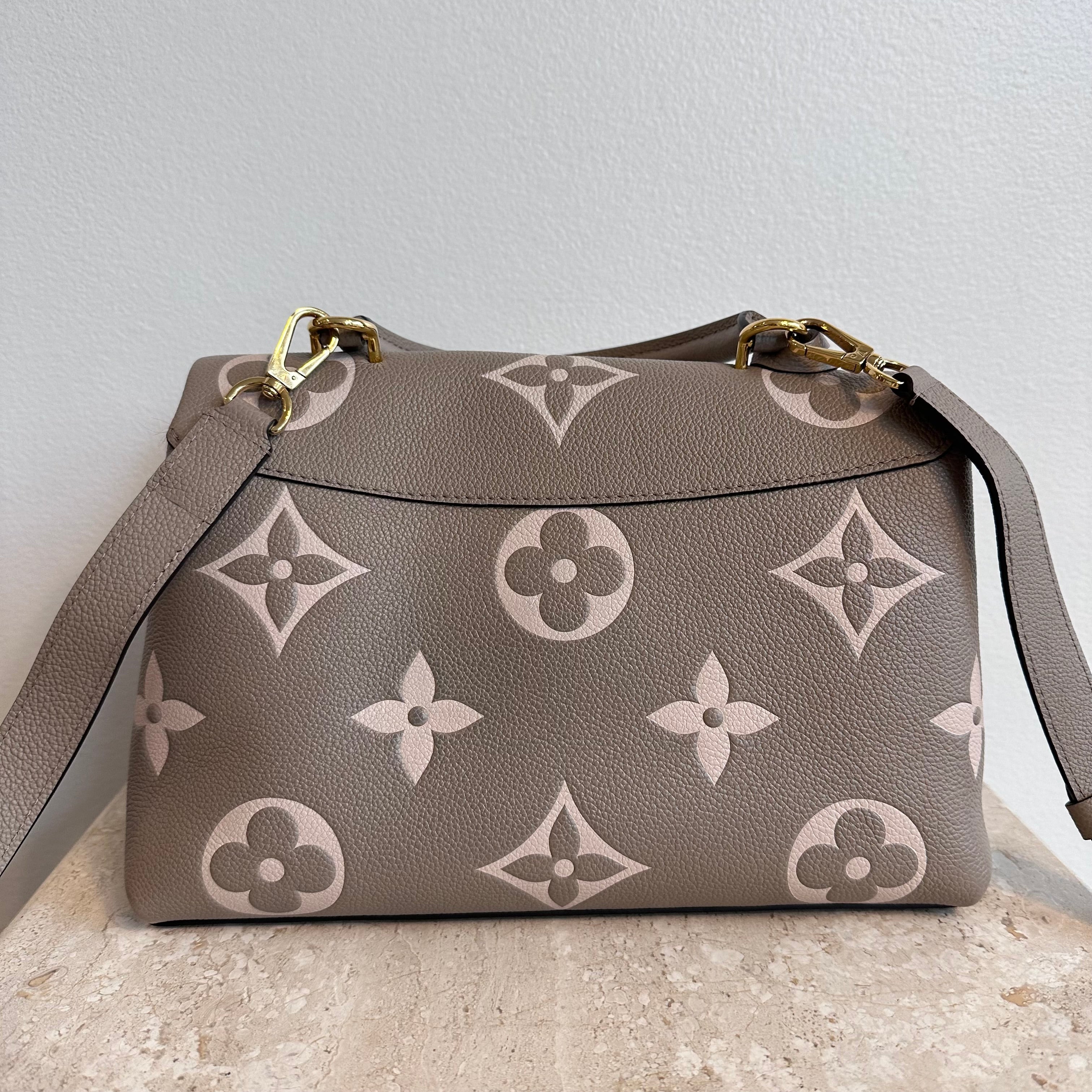 Pre-Owned LOUIS VUITTON Bicolor Monogram Empreinte Madeleine MM