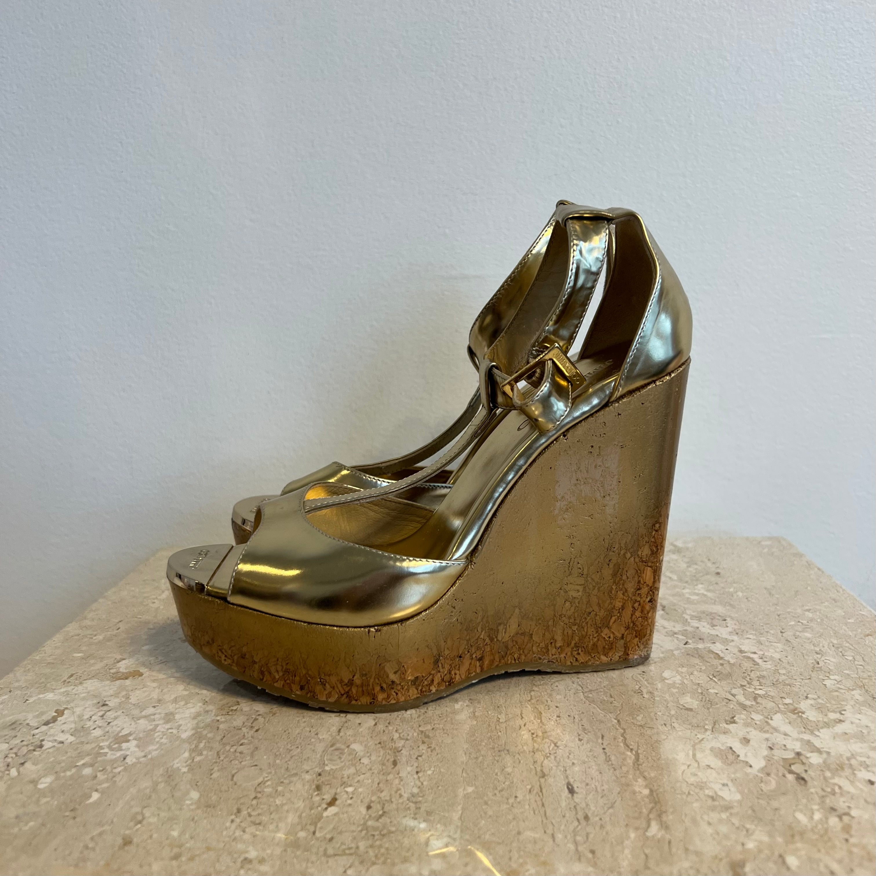 Pre-Owned JIMMY CHOO Gold Leather/Cork Pela Wedge - size  36.5