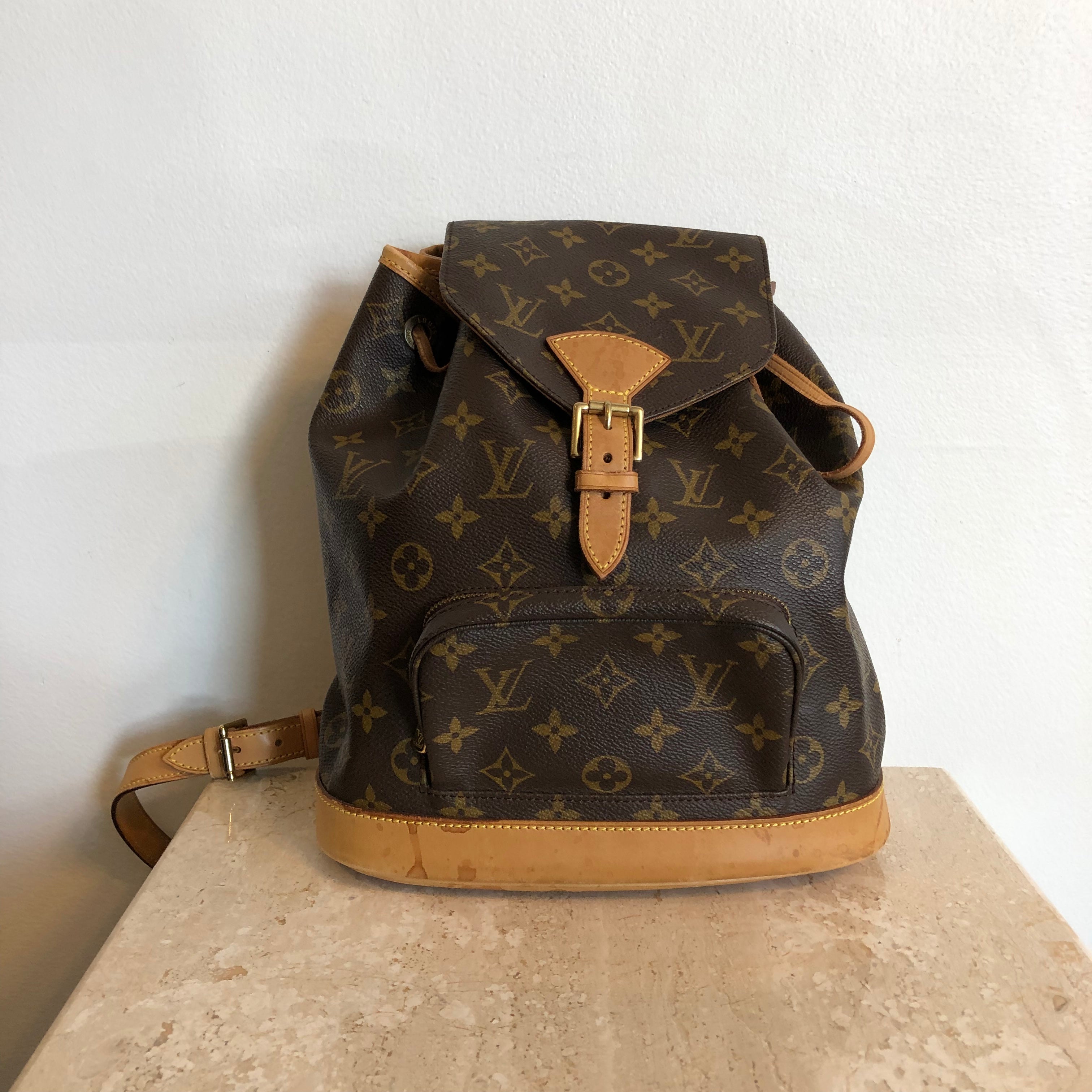 Montsouris vintage cloth backpack Louis Vuitton Brown in Cloth  26399206